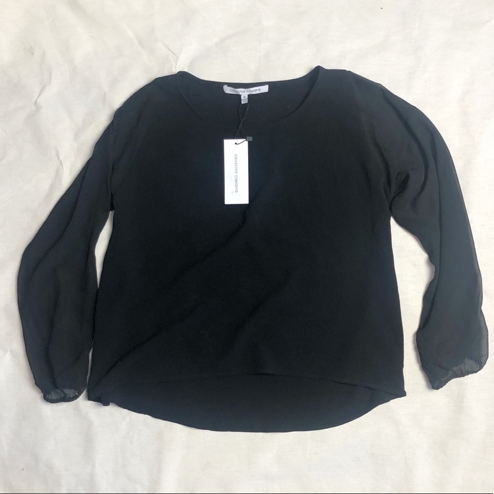 Versatile black blouse w/shear sleeves